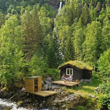Holiday home Retreat By The Falls & Riverside Sauna *