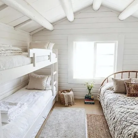 Holiday home Retreat By The Falls & Riverside Sauna *
